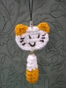 Crochet kitten with hanging tail
